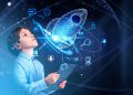 Boy with tablet looking at digital rocket and tech icons, symbolizing the future of education and innovation.